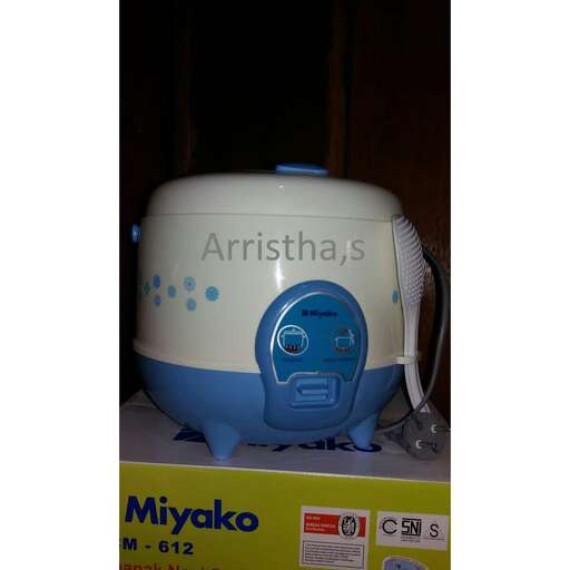 a blue and white toy in a box