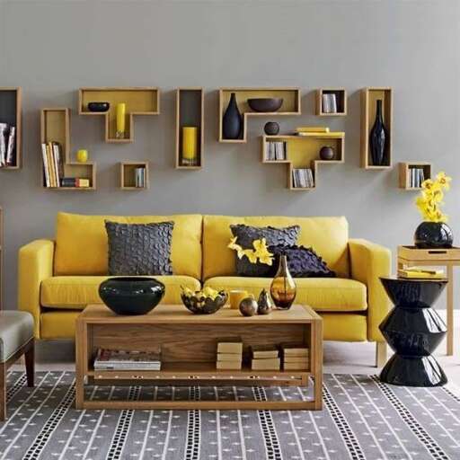 a yellow couch with a yellow couch and a table