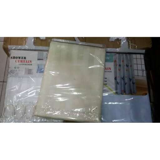 a white bag sitting on top of a plastic bag.
