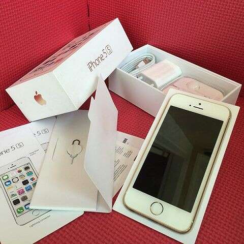 a box with a cell phone inside of it.