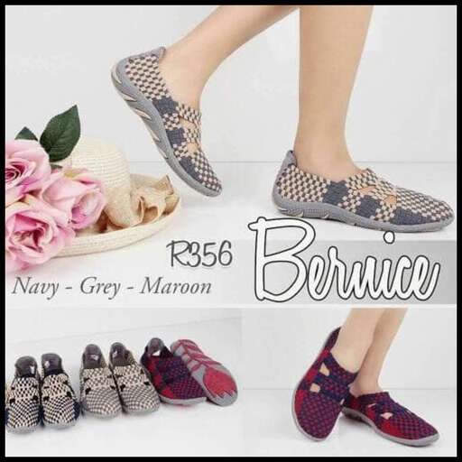 a pair of sandals with a floral pattern.