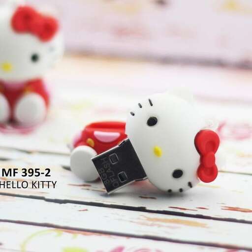 a toy cat with a tag on it's side.