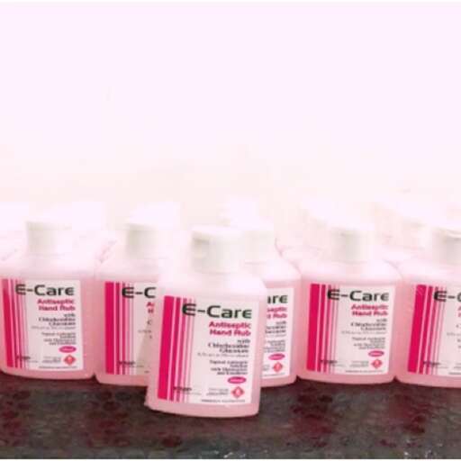 a group of bottles of nail polish on a counter.