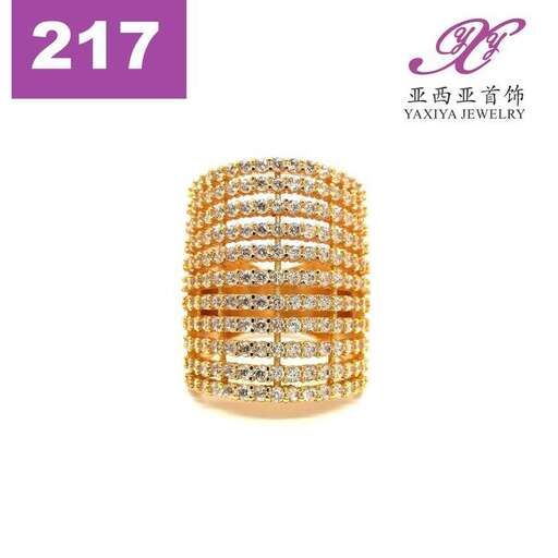 a set of 18k gold bangle with a diamond.