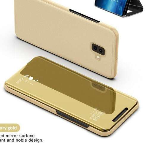 a gold cell phone with a reflection of a camera.