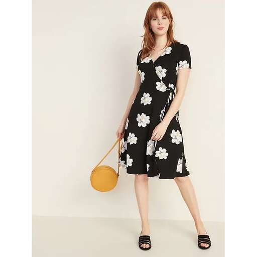the dress is a little bit more feminine than the dress.