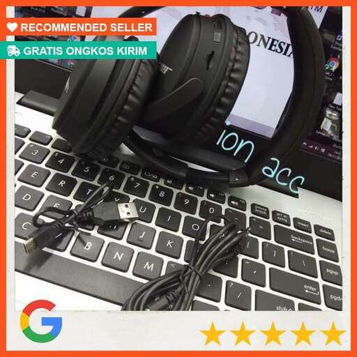 a pair of headphones sitting on top of a keyboard.