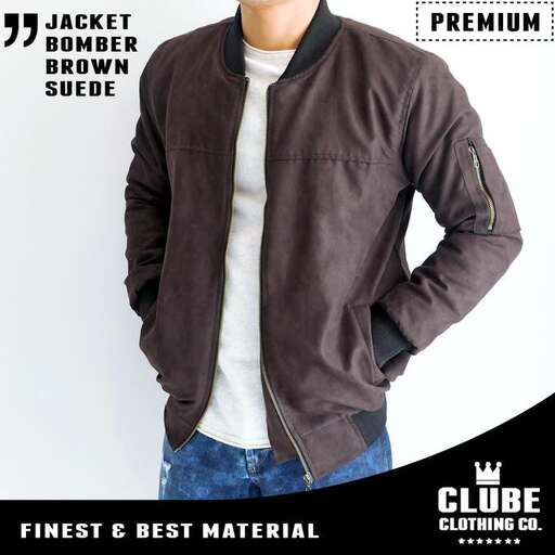 a man in a brown jacket