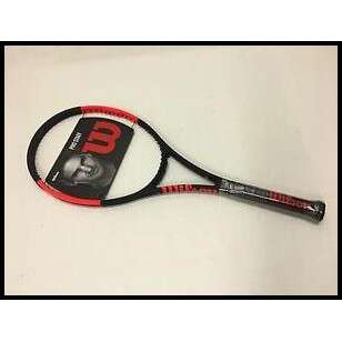 a tennis racket with a picture of a person on it.