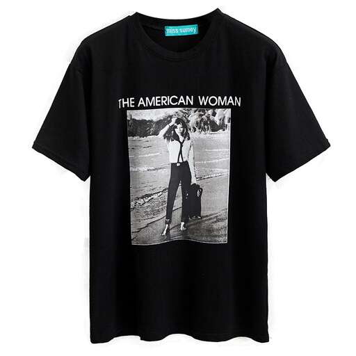 a woman's t - shirt featuring a photograph of a man on the front.