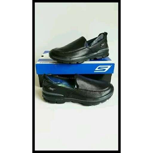 a pair of black shoes on a blue and white background.