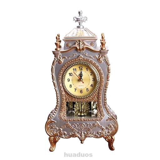 a large antique clock with a small clock face.
