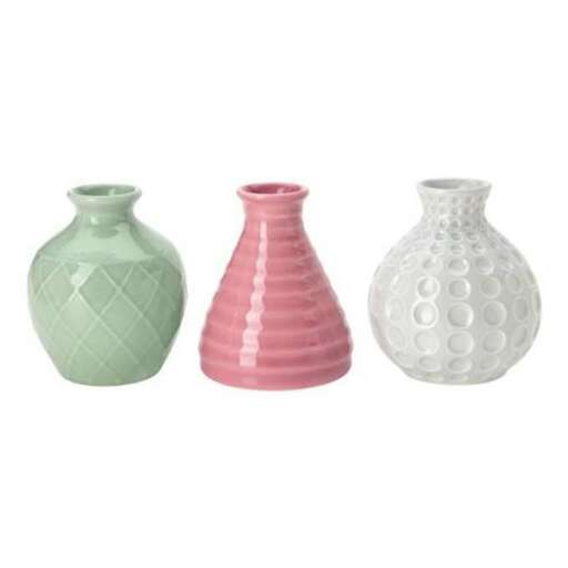 a set of pink and green vases