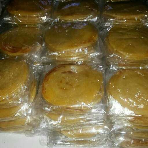 a bunch of food wrapped in plastic wrap.