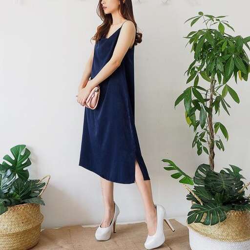 person in a navy blue dress