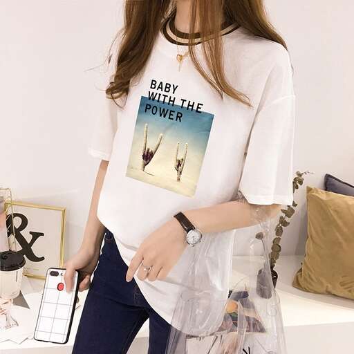 a white tee with a picture of a girl on it.
