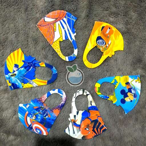 a selection of beach goggles and beach towel.