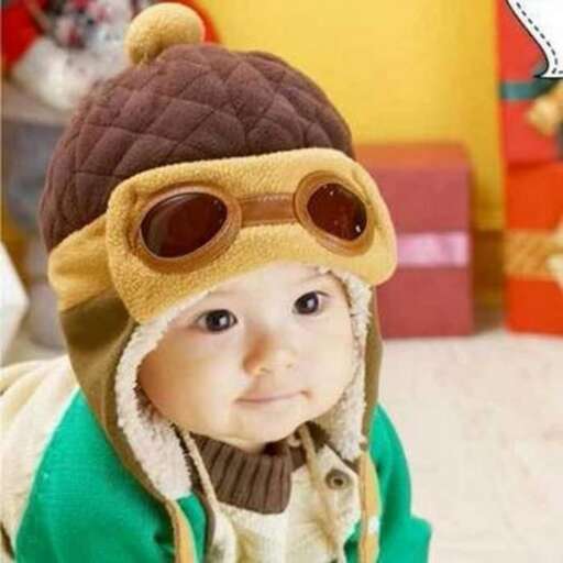 a baby in a hat.