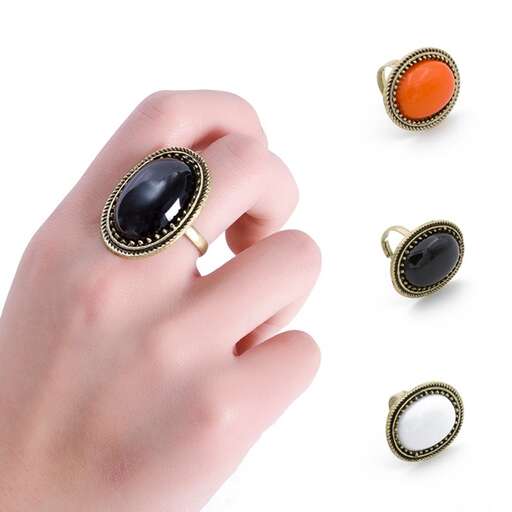 a ring that is made of sterling silver and orange