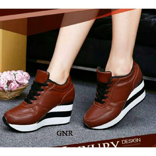 a pair of shoes with a touch of laces