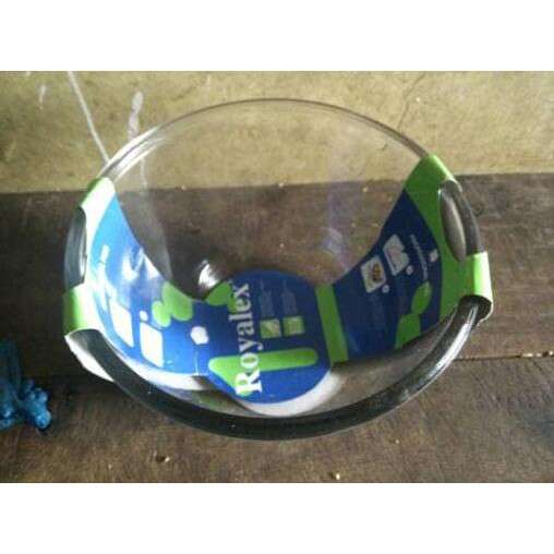a glass bowl with a blue and green design.