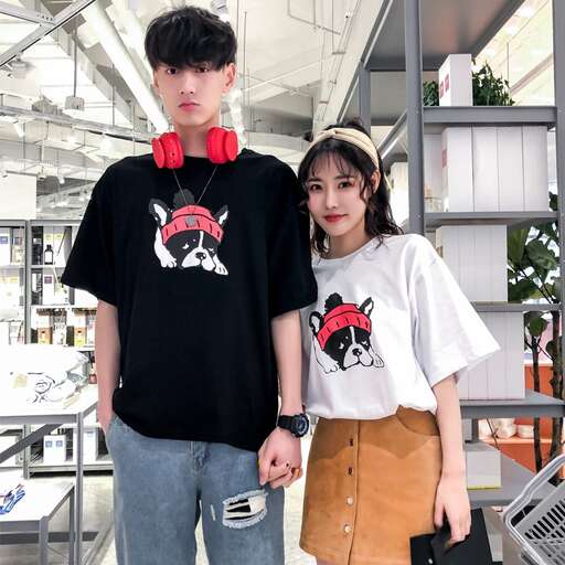 a boy and girl in red headphones