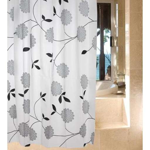 a shower curtain with black and white flowers.