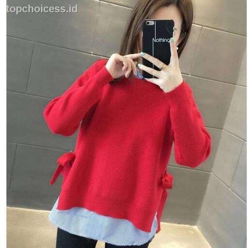 i love the red sweater with the sleeves.