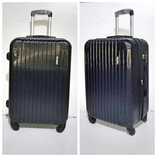 two black suitcases with wheels on each side.