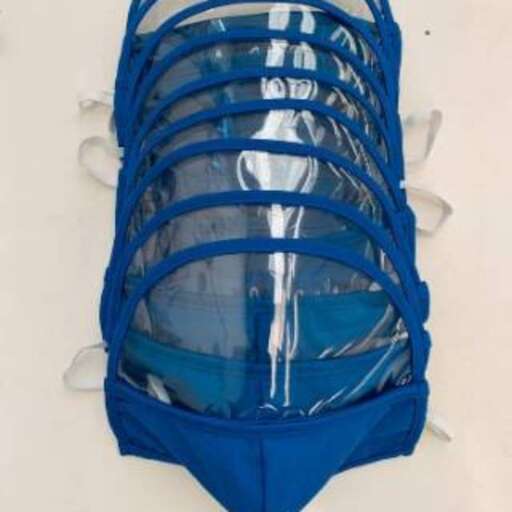 a beach chair with a blue cover.