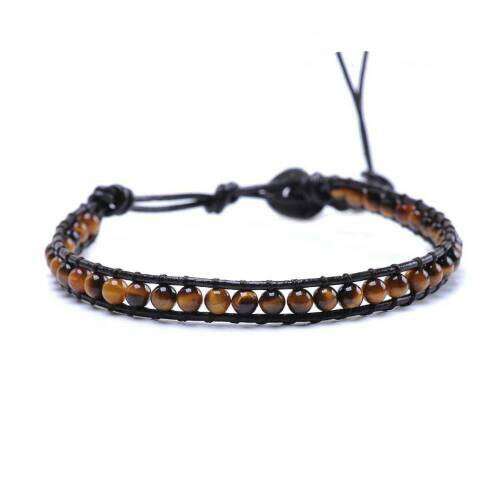 this bracelet is made of sterling silver and black glass beads.