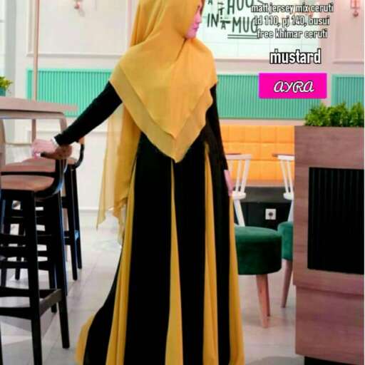 a woman in a yellow hijab