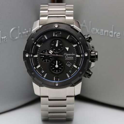 a watch with a black face and silver band.