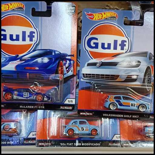 a collection of toy cars and cars