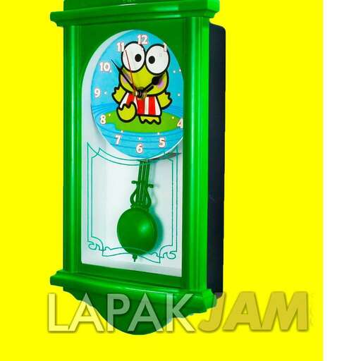 a green glass clock in the shape of a bird.