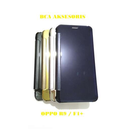 a black case with a gold strap and a gold buckle.