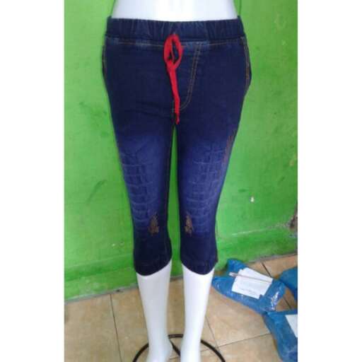 jeans with a red tie on the back