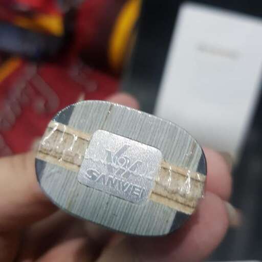 the metal is wrapped in a thick rubber band.