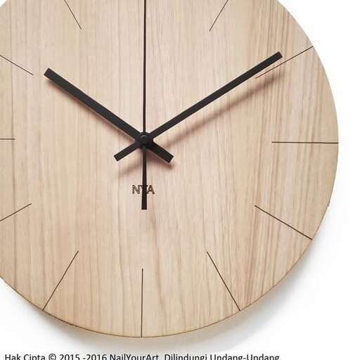 a large wooden clock with a wooden face.