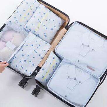 a suitcase with a shirt inside of it