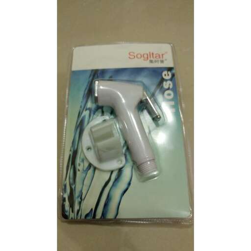 a plastic toothbrush in a package on a table.