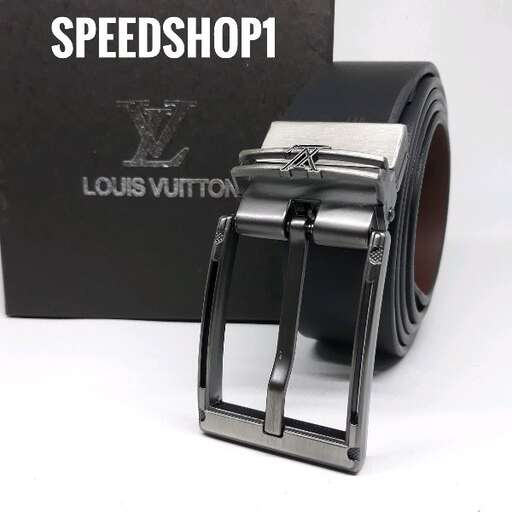 a watch that is on a white surface.