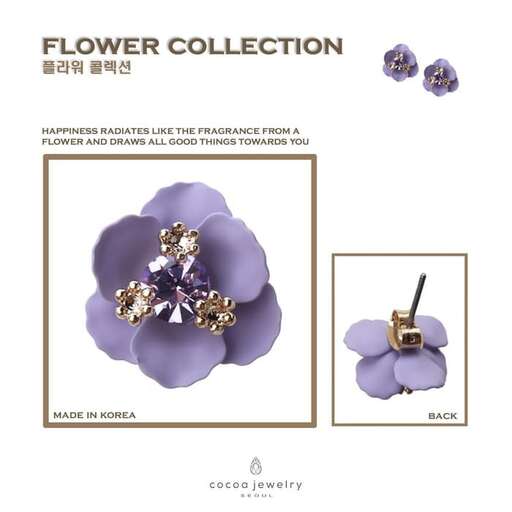 a collection of purple flowers and gold jewelry.