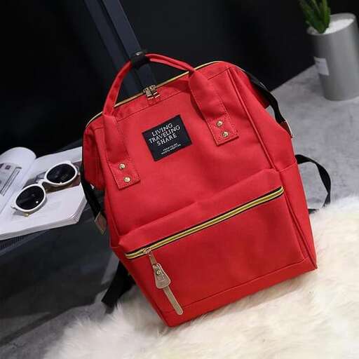 the red bag is a must for any traveler.