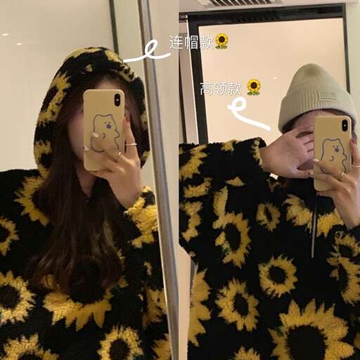 a girl in a yellow and black coat taking a selfie with her cell phone.