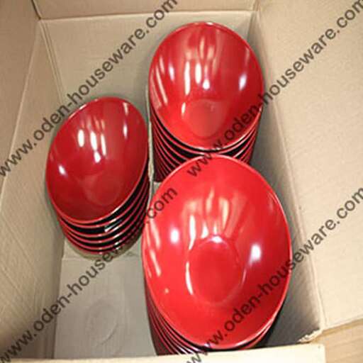 stack of red plastic cups in a box