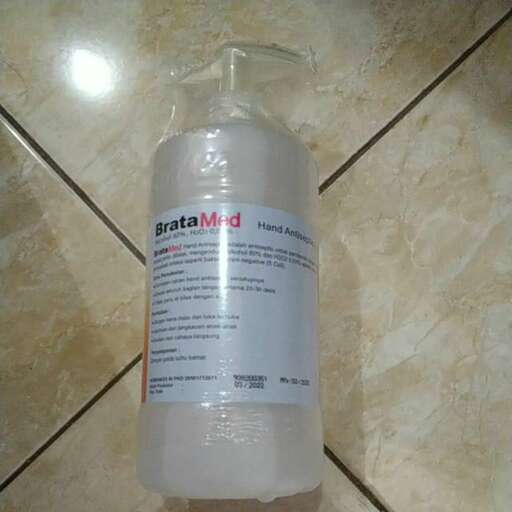 a bottle of water sitting on top of a counter.