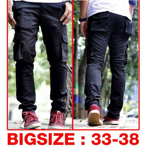 a man in black jeans and a white shirt