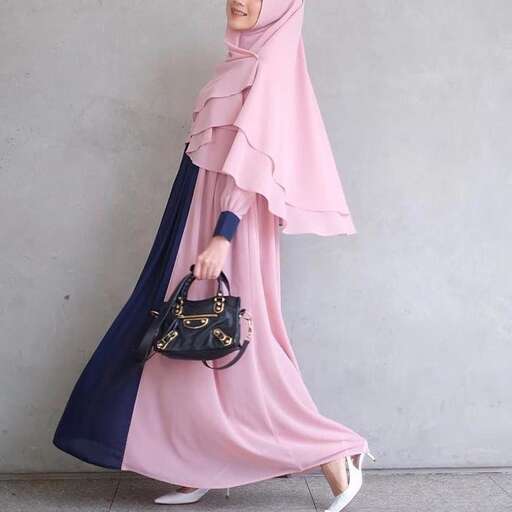 a pink and blue dress with a handbag