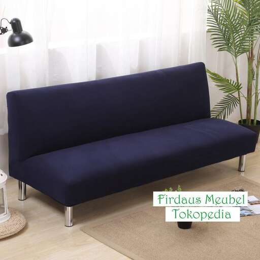a couch with a lamp and a lamp on it